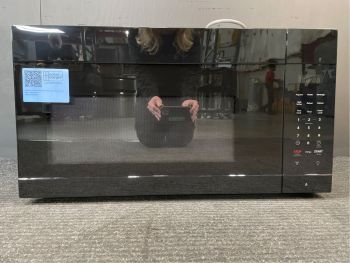 Microondas Frigidaire de 1.7 pies cúbicos de capacidad y 30 pulgadas de ancho para instalar sobre la estufa, color negro - FMOS1746BB